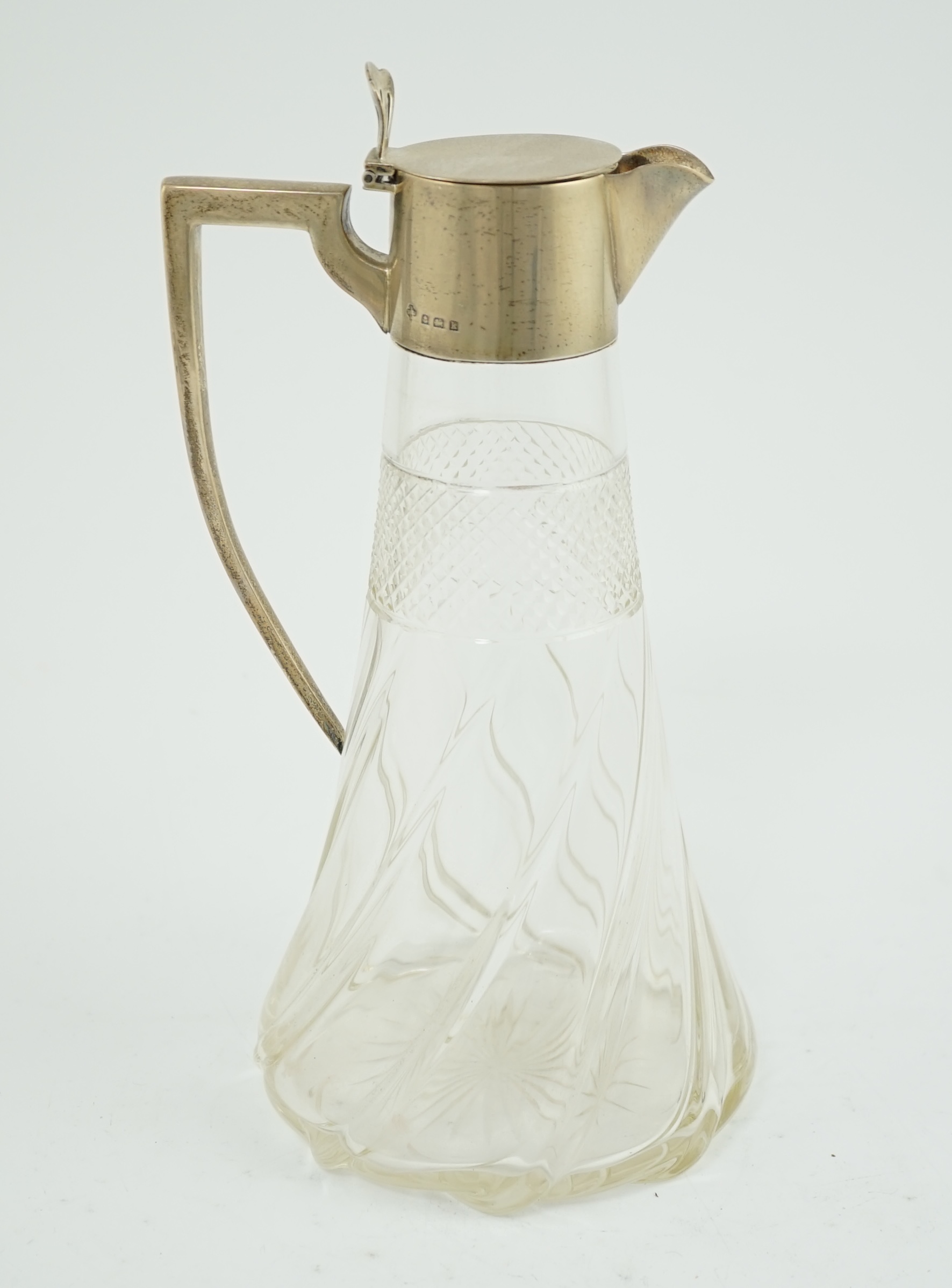 An Edwardian silver mounted cut glass claret jug, by William Hutton & Sons Ltd